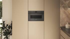 Mikrovlnná trouba Whirlpool WMD7O4TSG šedá barva

