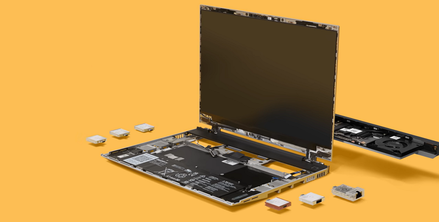 Framework Laptop 16: Konec pevně daných notebooků? Framework Laptop 16 s vyměnitelnými komponentami na oranžovém pozadí