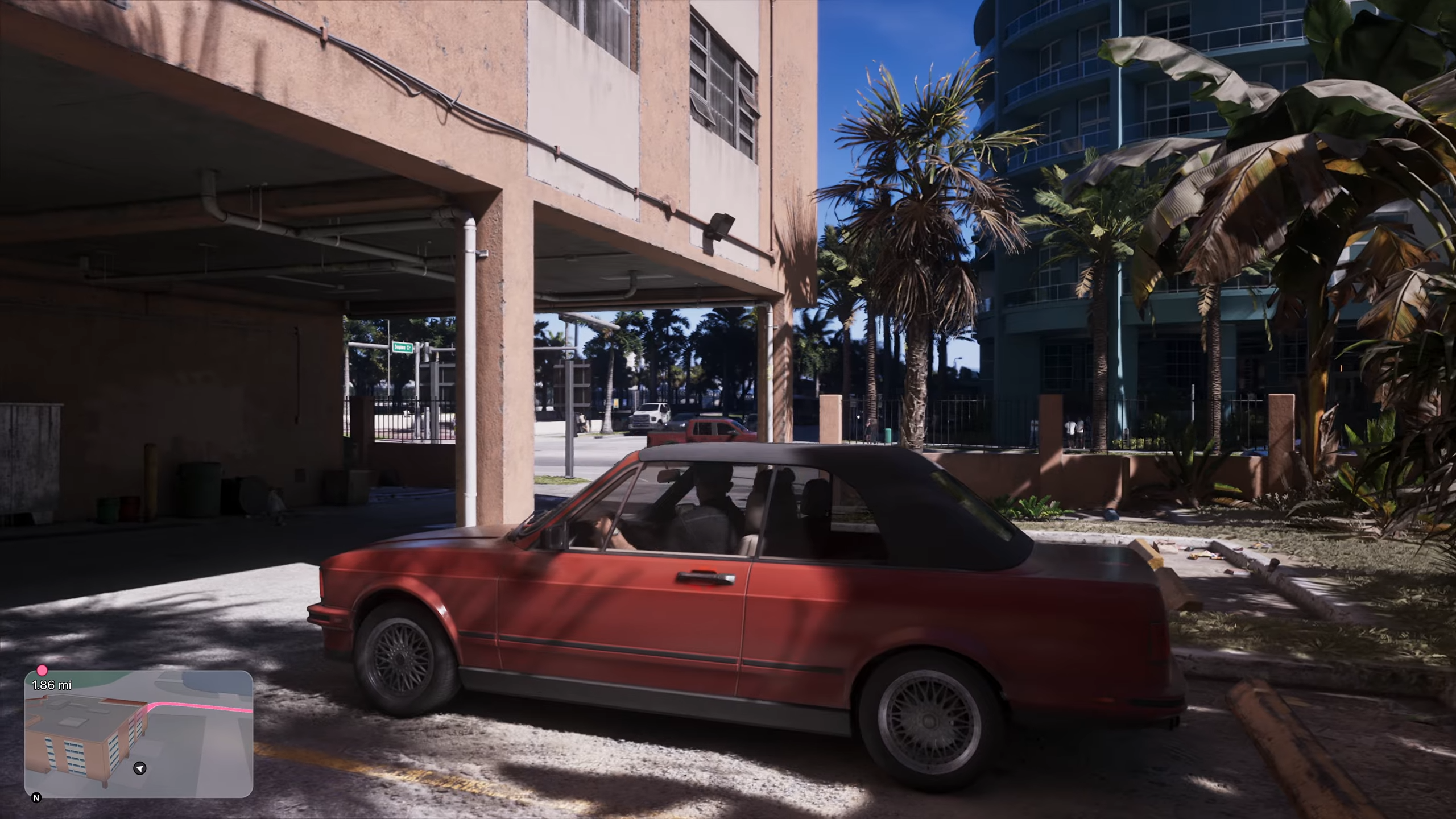 Grand Theft Auto VI: Vše o nejočekávanější hře desetiletí – předobjednávky spuštěny (aktualizováno) Červené auto parkuje na parkovacím místě, v levém dolním rohu je minimapa