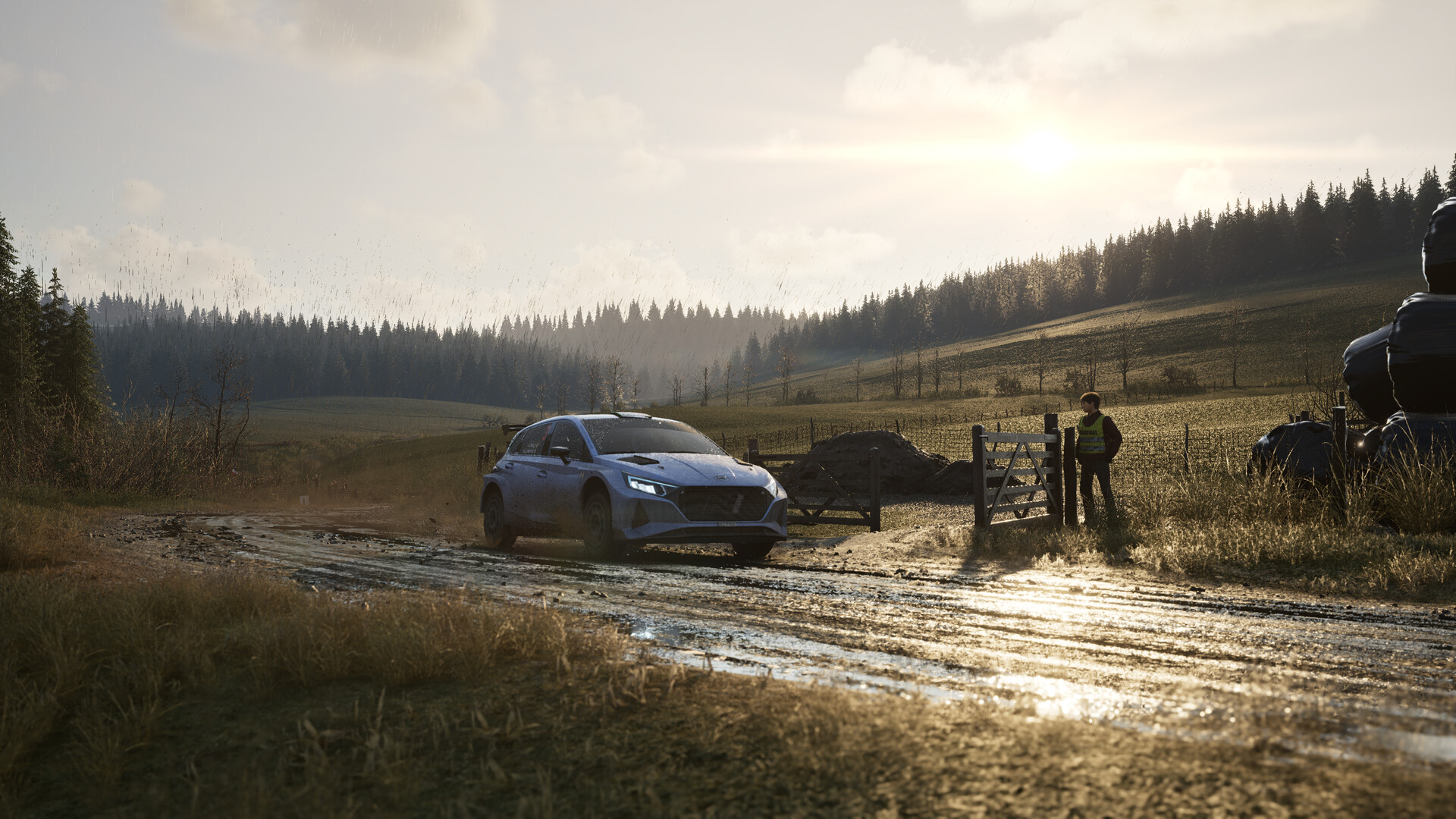 Assetto Corsa Rally: Šampion v simracingovém realismu Krajina ozářená sluncem, na rozbahněné cestě stojí závodní auto