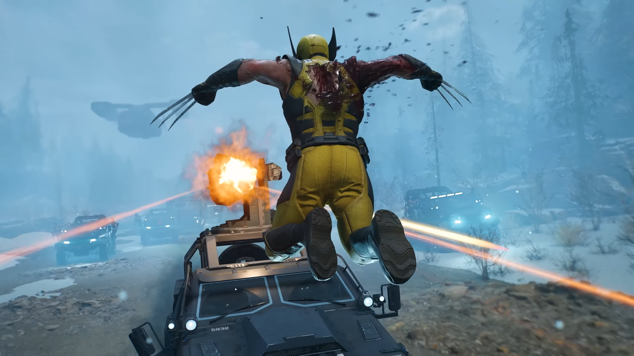Wolverine ve skoku nad přijíždějícími auty, na pozadí je výbuch