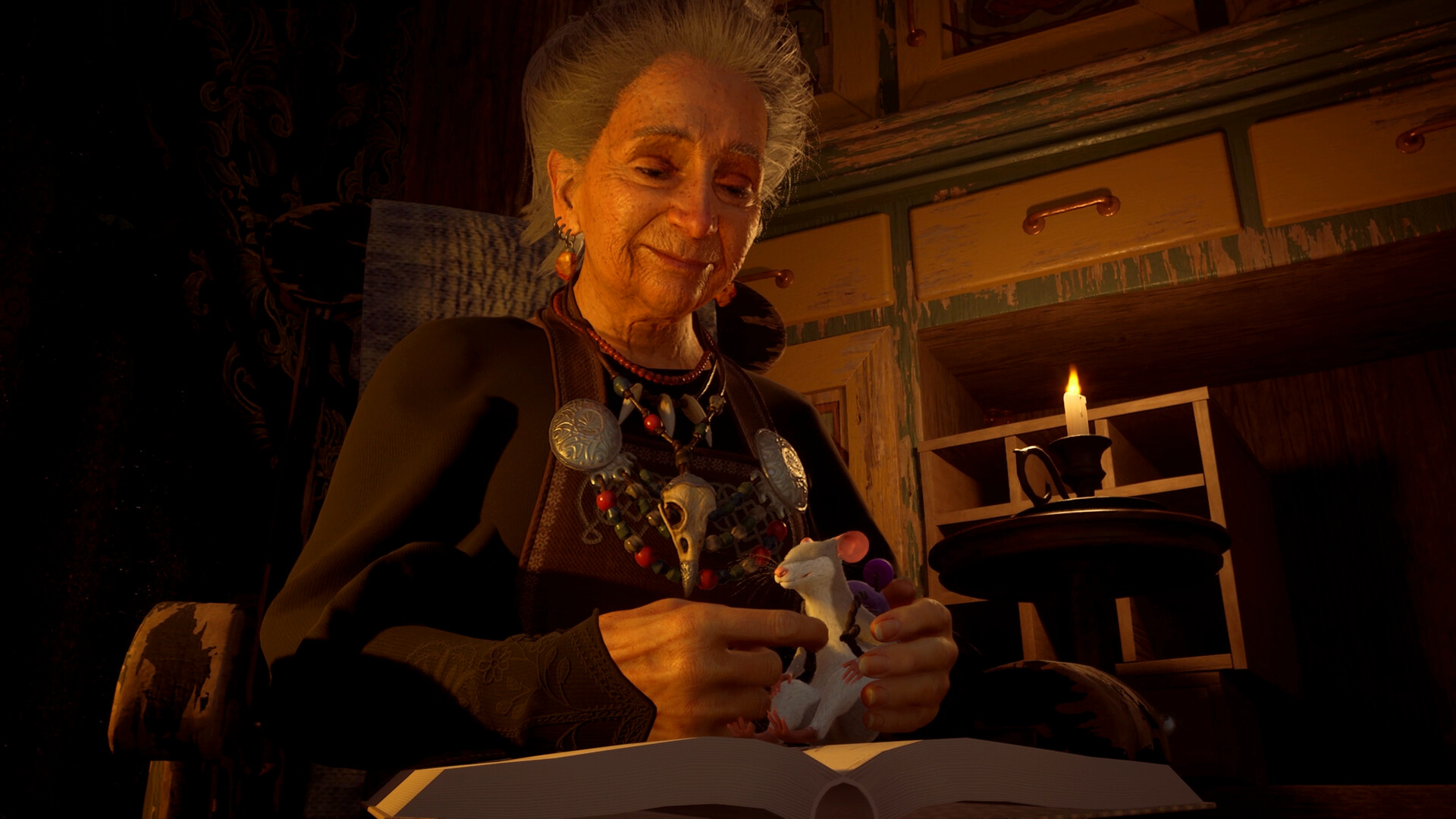 Čarodějka ze hry Hela: of Mice & Magic sedí v křesle a drží v rukou myš