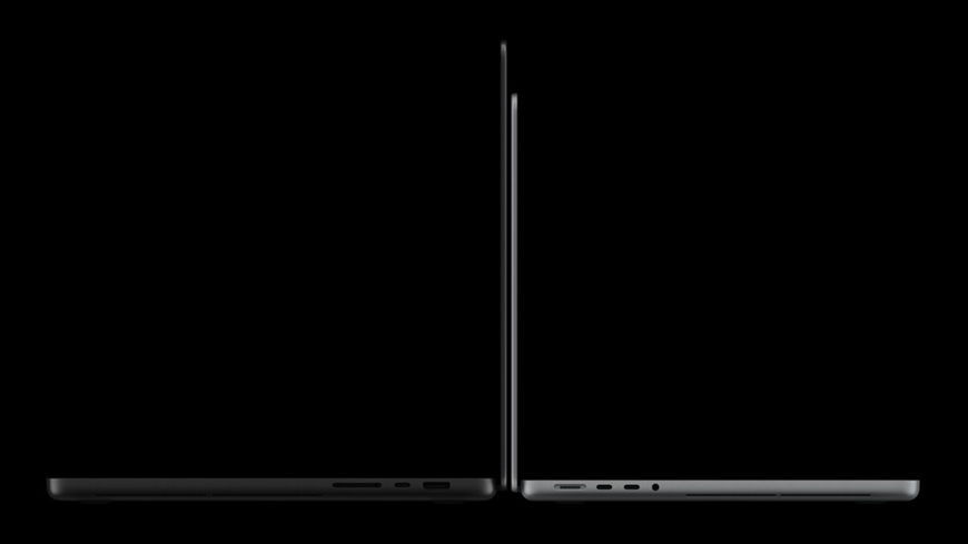 Láska na první PROLED! Apple do třetice všeho nového představil první dotykový MacBook Pro Pohled zboku na dvě o sebe se opírající varianty MacBooku Pro s PROLED displejem